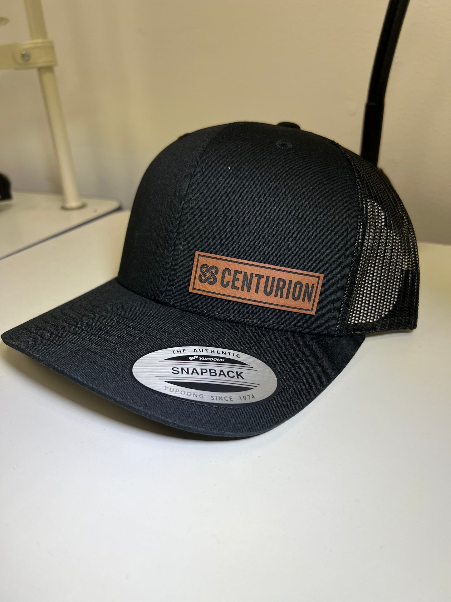 FLEXFIT TRUCKER MESH - ATC6511 - CENTURION LOGO - LP (IN LEFT PANEL)